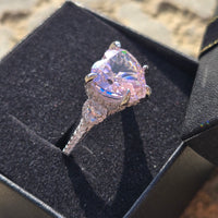 bold pink heart standing in ring box sunlight